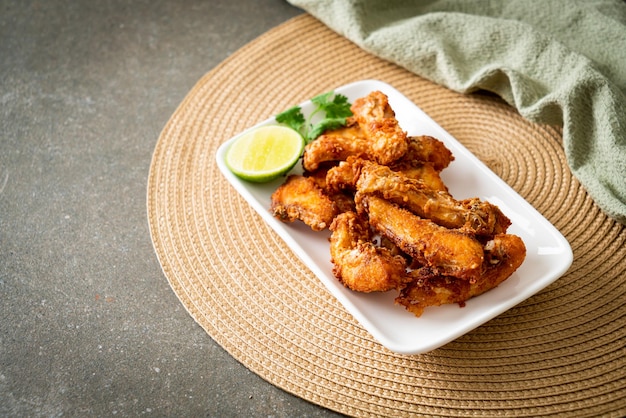 Fried Snapper Belly on white plate