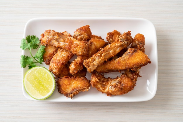 Fried Snapper Belly on white plate