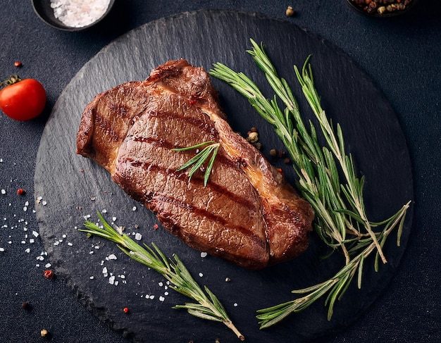 fried steak on a dark background