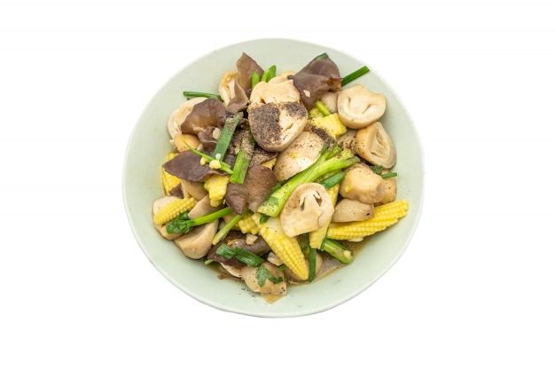 Fried stir mixed vegetable mushroom and baby corn with oyster isolate on white background