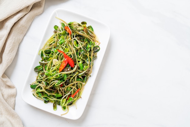 Fried sunflower sprouts with oyster sauce