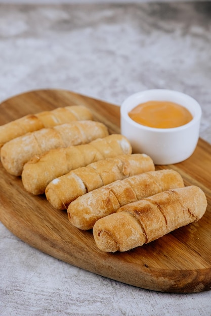 Fried tequenos fingers stuffed with salty artisanal cheese typical Venezuelan and Latin American food