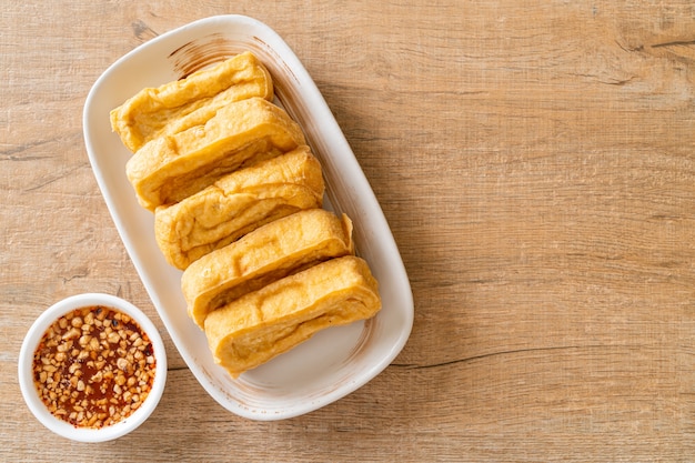 fried tofu with sauce. vegan and vegetarian food style