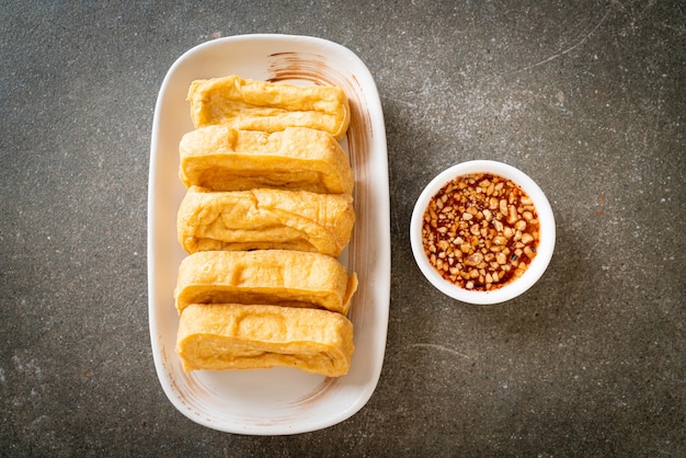 fried tofu with sauce - vegan and vegetarian food style