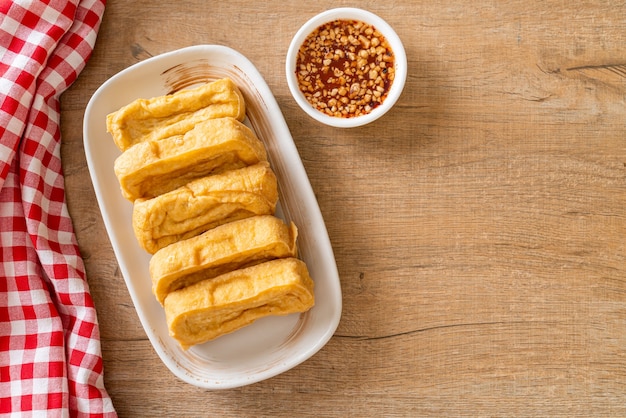 fried tofu with sauce - vegan and vegetarian food style