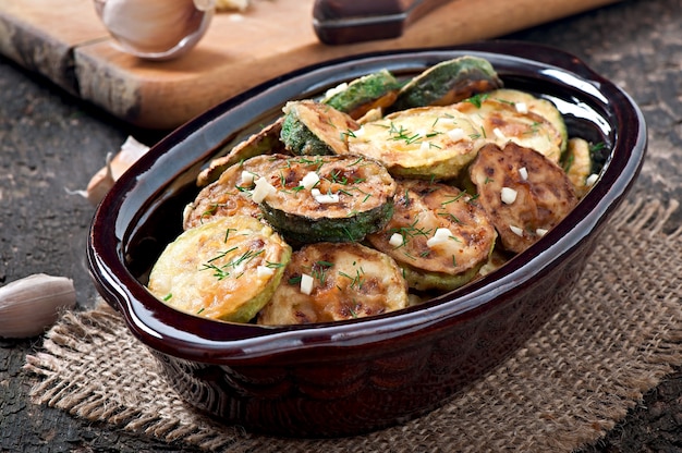 Fried zucchini in an old ceramic bowl