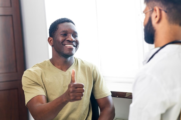 Friendly doctor hands holding patient hand support and hope concept