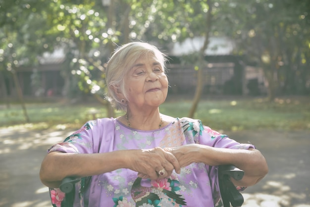 Friendly old woman expressing positive emotions