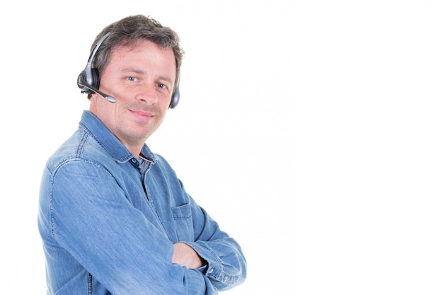 Photo friendly telephone operator man isolated on white  with side copy space and arms crossed