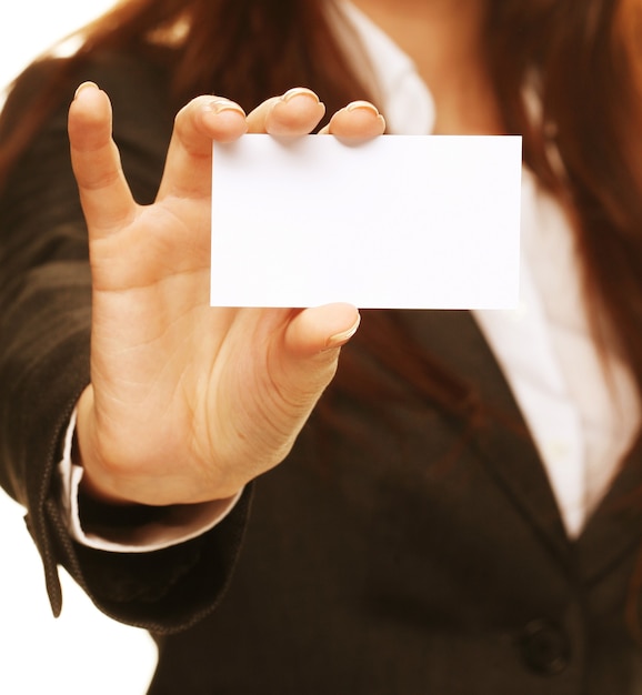 Friendly woman holding a business card and smiling