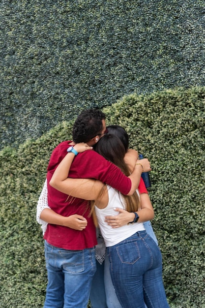 Friends greeting each other and embracing