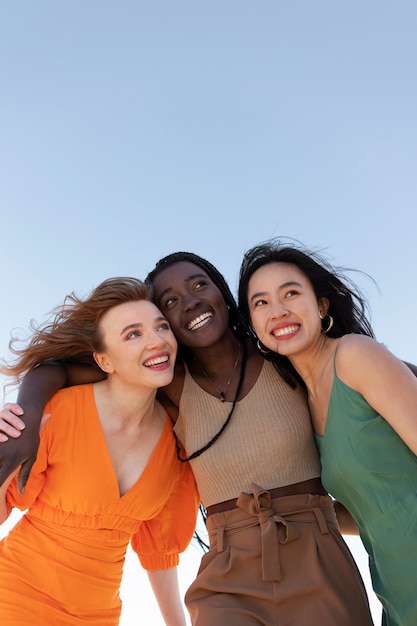 Friends having fun by the sea side