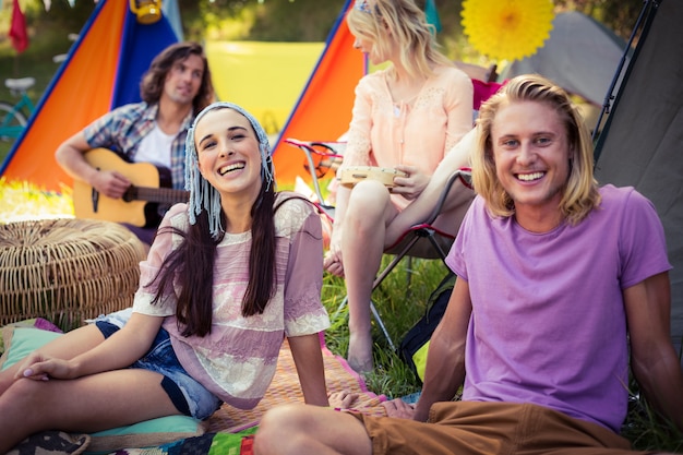 Friends having fun together at campsite