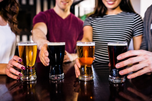 Friends having a pint in a bar