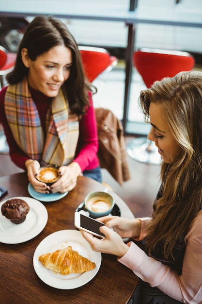 Friends using their smartphone