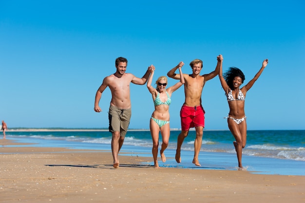 Friends in vacation at the beach