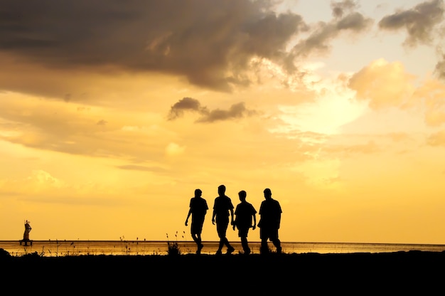 friends walking on the beach