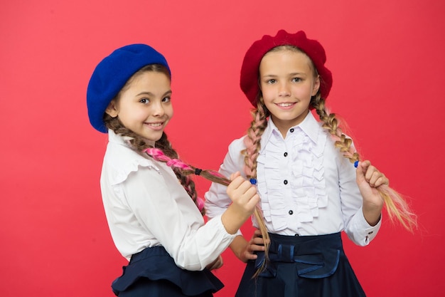 Friendship and sisterhood best friends International exchange school program school friends small girls in french beret happy children in uniform Education abroad kid fashion You are so smart