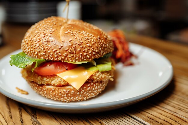 Fries and sancwich combo on the plate.