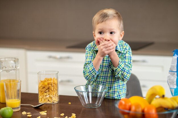 Frightened little boy showing his food aversion