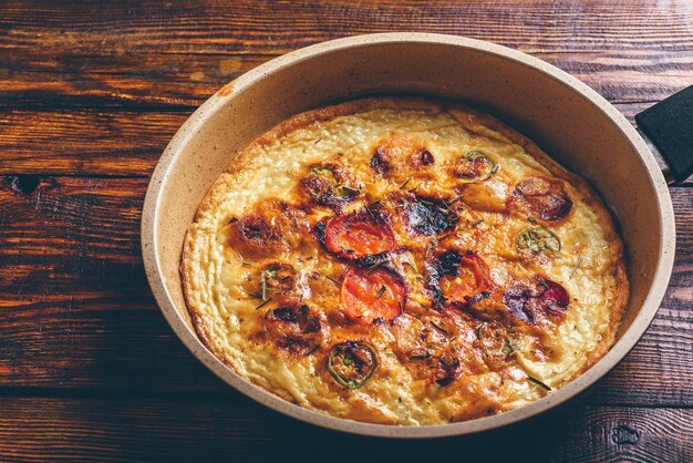 Frittata with chorizo tomatoes and chili peppers