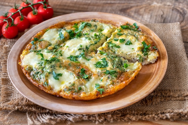 Frittata with ground meat and mozzarella on a plate