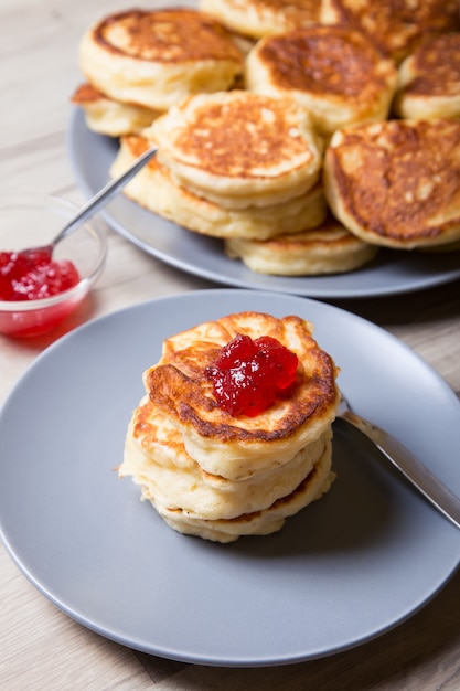 Fritters on kefir, yeast dough. Traditional Russian dish