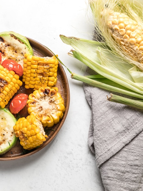 From above grilled  vegetables on dishes