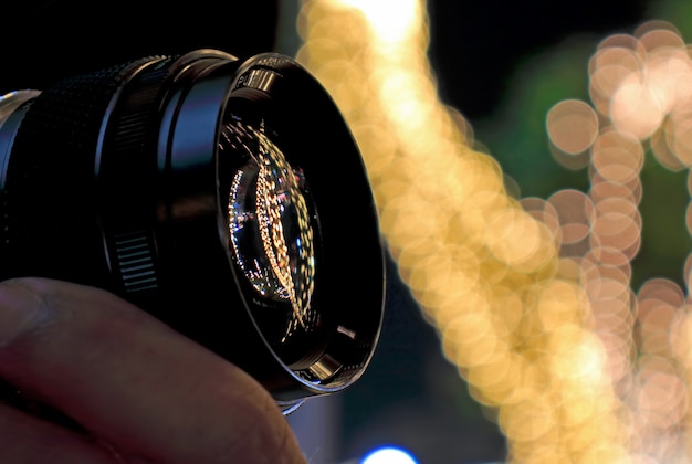 Front of the lens of photographer being taking pictures decorative lights