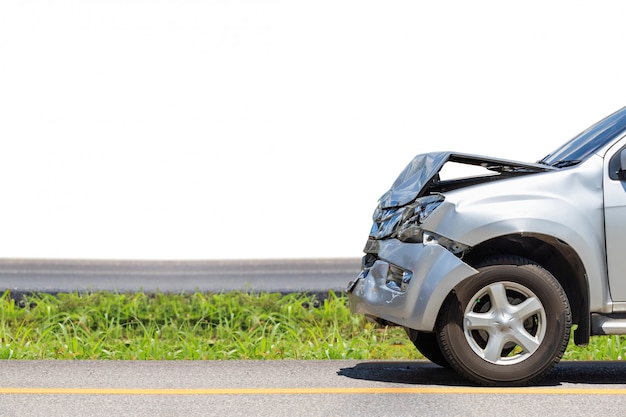 Front side of silver car get damaged by accident on the road