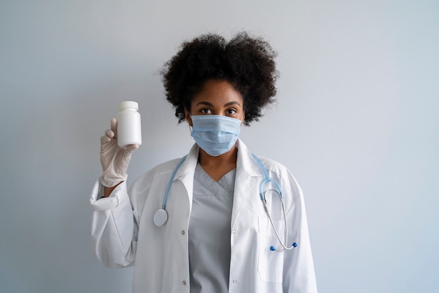 Front view black female doctor with mask