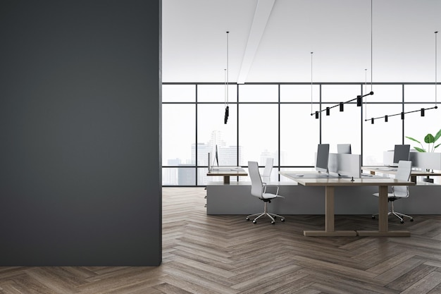 Front view on blank dark wall with space for your advertisement in coworking office with modern furniture wooden floor and light high ceiling and city view from panoramic window 3D rendering mockup