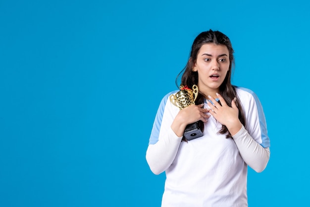 Front view female player with trophy