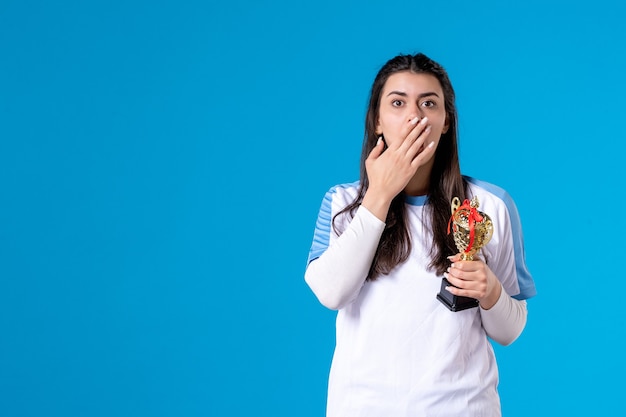 Front view female player with trophy