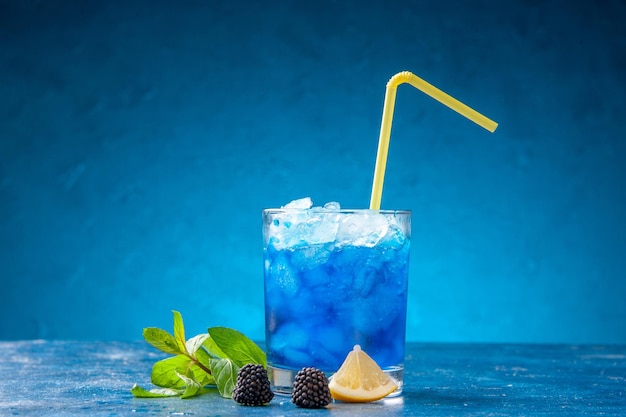 Front view fresh cool lemonade inside little glass with ice on blue background water cold juice drink fruit cocktail colors bar