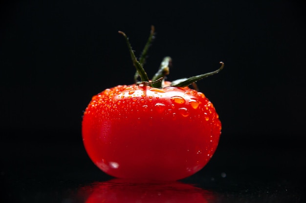 Front view fresh red tomato on black background color ripe mellow tree photo pear exotic vegetable salad