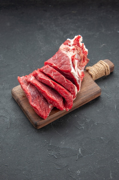 front view fresh sliced meat raw meat on a dark background meat butcher food animal color barbecue meal