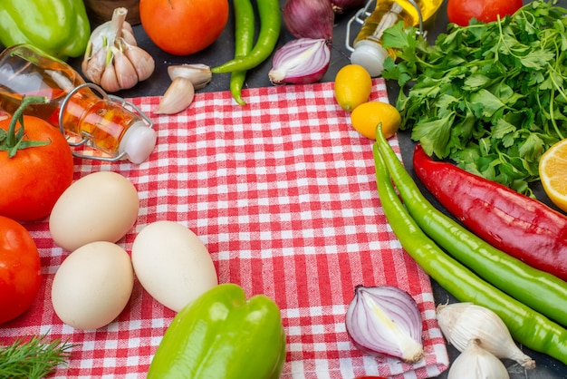 front view fresh vegetables with greens and eggs on a dark background photo salad meal health diet color food milk