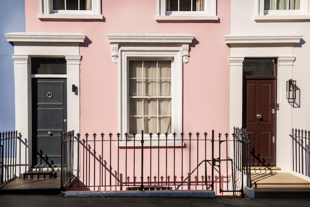 Front view of front doors with pink wall