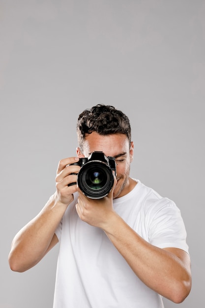 Front view of male photographer with copy space