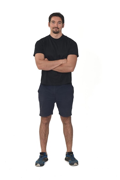 Front view of man wearing sportswear, shorts isolated on white background