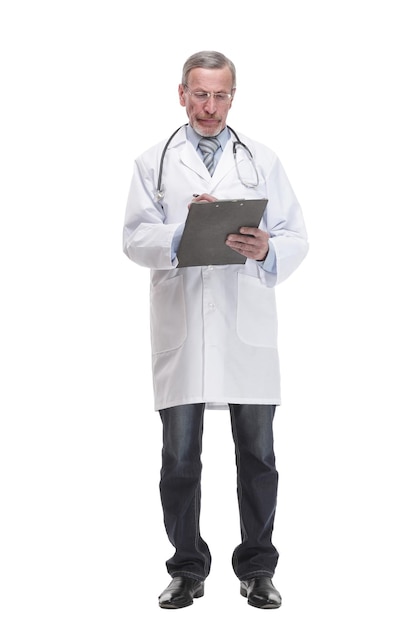 Front view of mature thoughtful doctor writing on clipboard