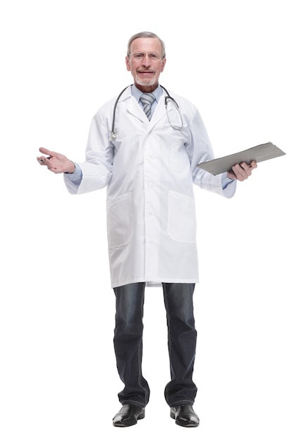 Front view of mature thoughtful doctor writing on clipboard