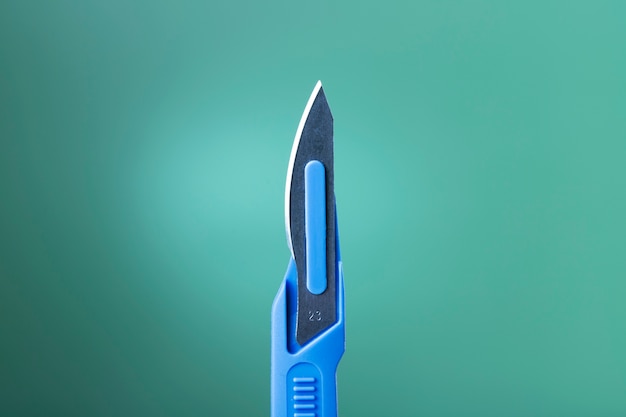 Front view of metallic medical scalpel