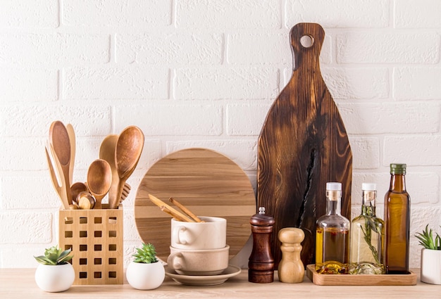 Front view of the modern countertop with many different kitchen items for cooking ecologically clean kitchen