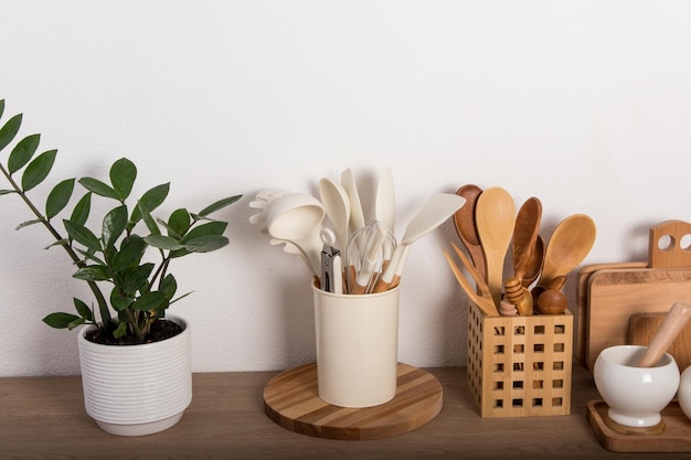 Front view of a modern kitchen countertop with homemade cooking utensils made of eco materials the concept of cooking healthy food