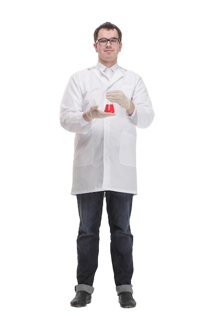 Front view portrait of confident male doctor standing with arms crossed