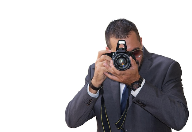 Front view of a professional photographer on white background