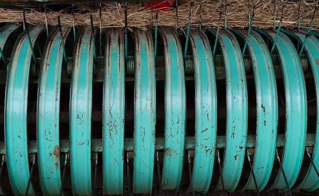 Front view of the rake of a mechanical grass baler