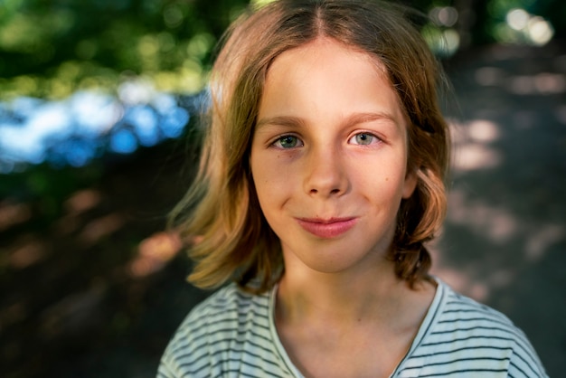 Front view smiley kid outdoors